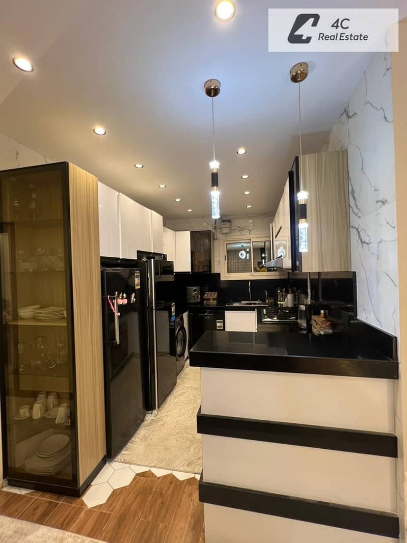 Ground floor apartment for sale in Taj City with an area of 155m and a garden of 105m, fully finished and ready for delivery at the best cash price. - Más