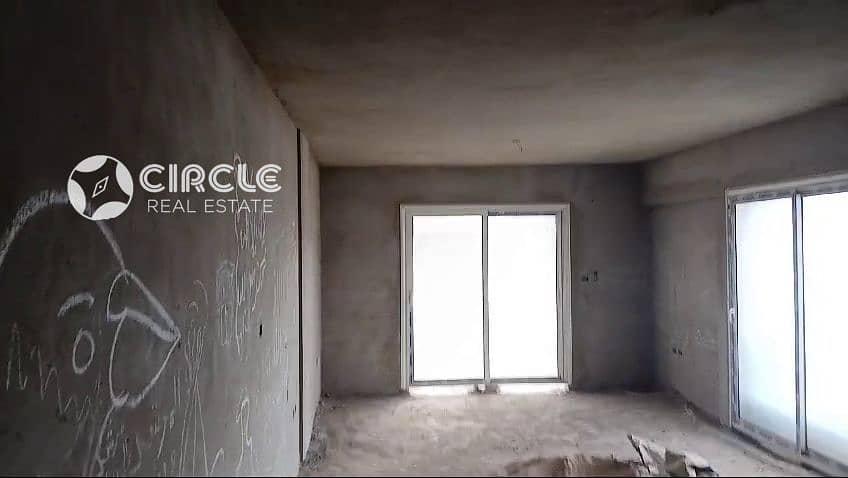 Near AUC 132m Apartment 2nd Floor Prime Location 2 Bedrooms For Sale In The Square Sabbour 5th Settlement New Cairo - Widok 3