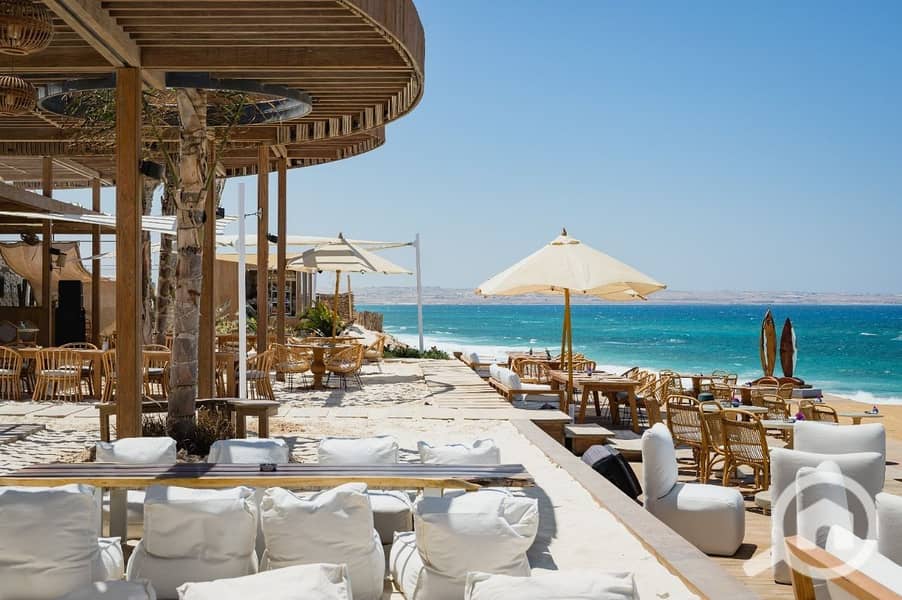 fully finished chalet for sale in El Masyaf with Prime Location in Ras El Hekma, North Coast - Widok 6