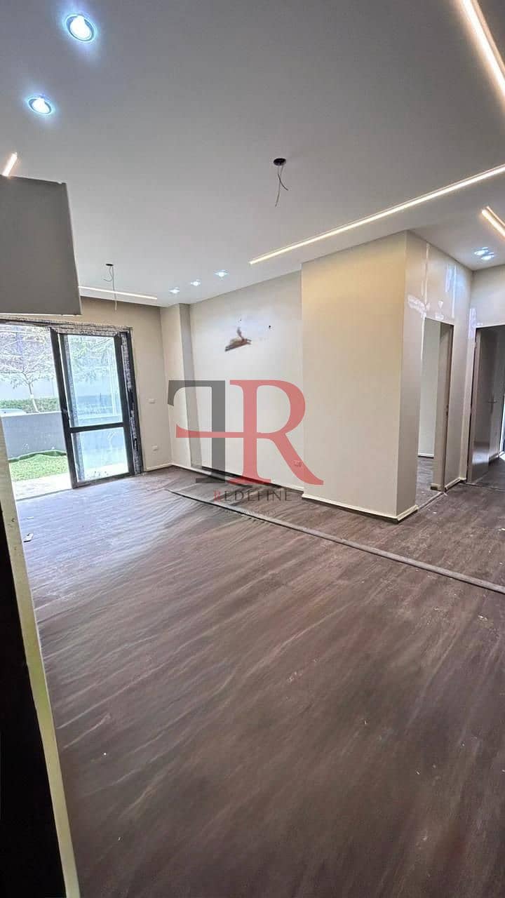 Apartment for sale with private garden ready to move super lux finishing in patio oro compound new cairo - Fler