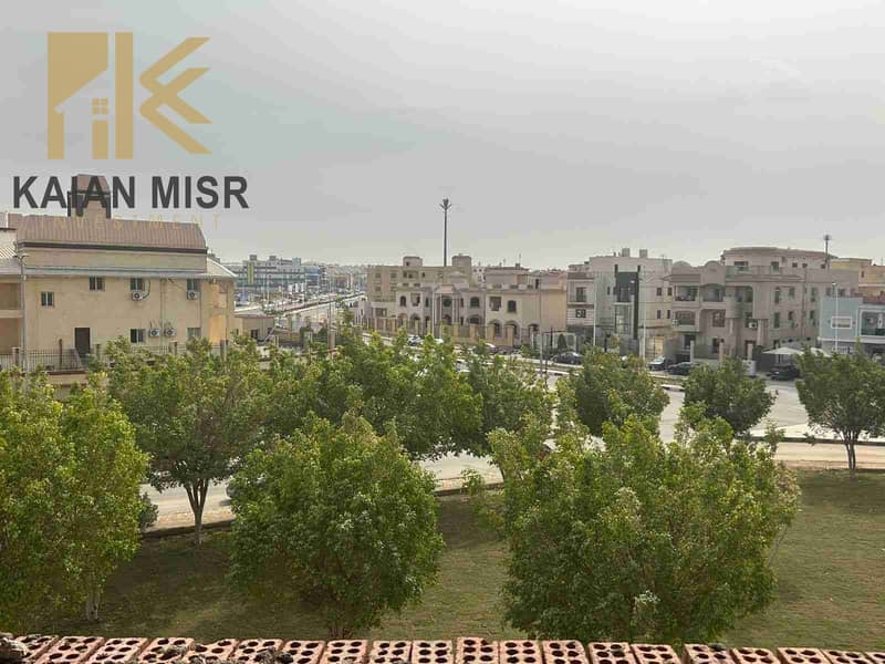 An elevated land plot of 190 m + 20 m garden with a front view of a garden in Al-Shorouk City next to Saudi and the French University - Vista 4
