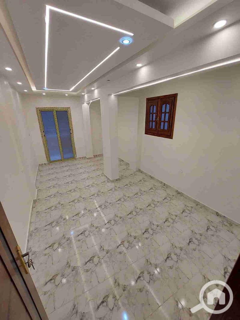 Apartment for sale for investment in Al-Asafwa with a stunning sea view, two bedrooms and a hall. - Vista 3