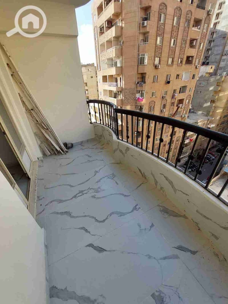 Apartment for sale for investment in Al-Asafwa with a stunning sea view, two bedrooms and a hall. - Vista 5