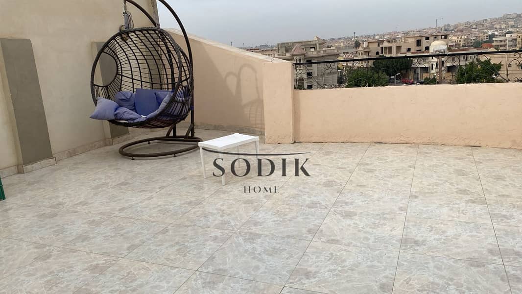 Rooftop with a garden view in the Fifth Settlement, perfect for those seeking privacy and tranquility, at the price of a semi-finished apartment - Widok 5