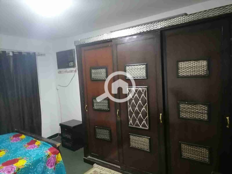 Furnished apartment in Maadi, 105 El-Raisi Street, fourth floor, consists of two bedrooms, reception, bathroom, kitchen, and 2 balconies, one of which overlooks El-Raisi Street. - Aanzicht 4
