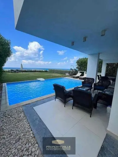 Receive immediately in JUNE SODIC a villa with a swimming pool by the sea, finished with air conditioning, featuring 5 bedrooms + a nanny room + a driver room next to Jaya and Swan Lake Ras El Hikma and Mountain View and Direction White.