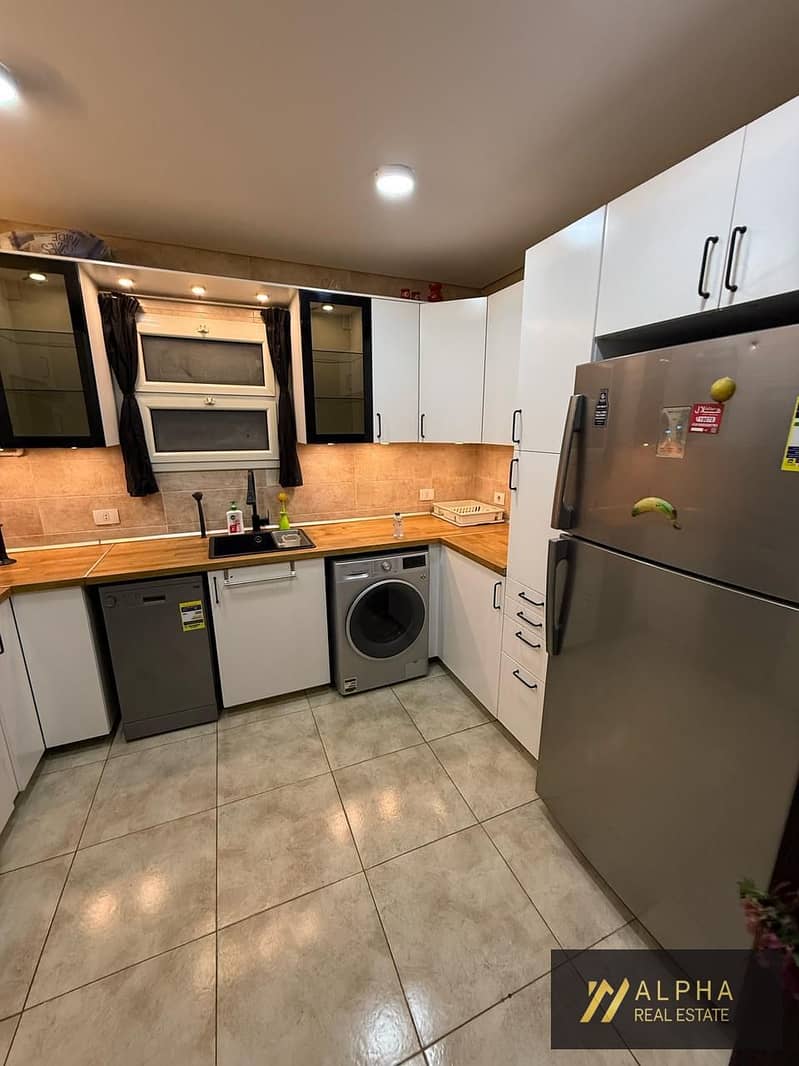 Ground floor apartment with garden for rent in 90 Avenue New Cairo 165 sqm plus 120 sqm garden 3 bedrooms 2 bathrooms fully furnished luxury compound - Mehr