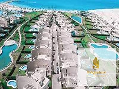 شاليه 2 غرفة نوم للبيع في الساحل الشمالي، مطروح - download (1). jpg
