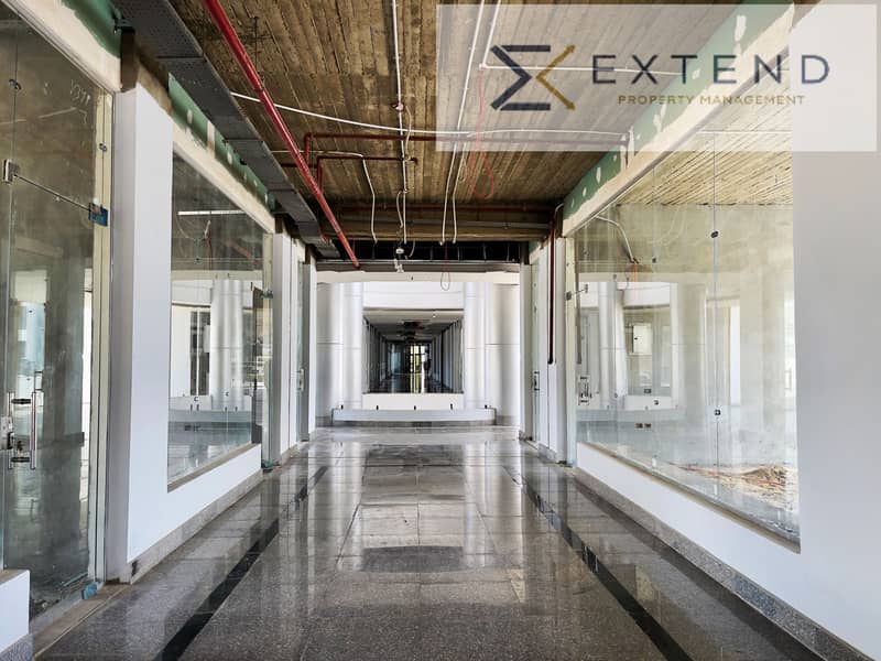 At the lowest price per meter in the heart of 6th of October on the central axis in a strategic location with a large daily foot traffic, a shop for rent with an area of 30m suitable for various activities and a front display. – pohled 4