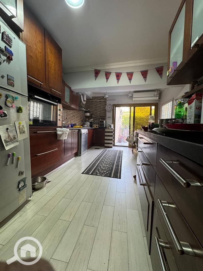 townhouse midddle for sale in Mina Garden City, behind Dar Al Fouad Hospital and Misr University for Science and Technology, - Mehr