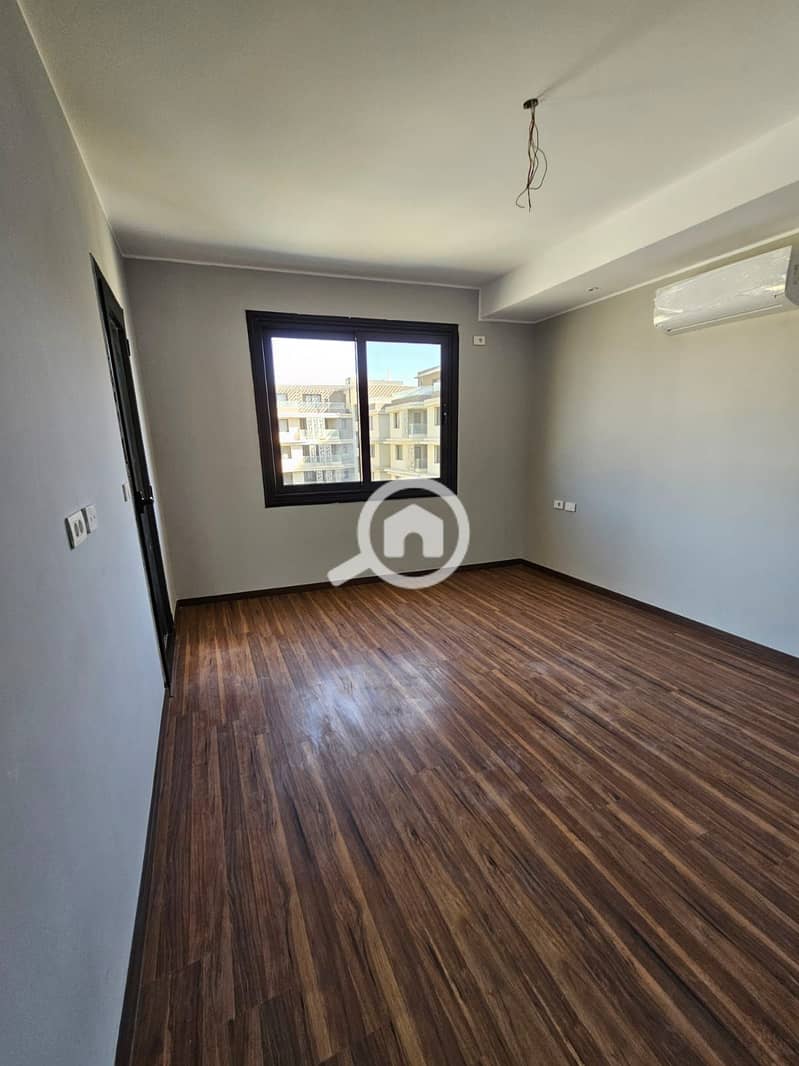 Apartment for rent in the Badya compound in Palm Hills, near MSA University and minutes from Mall of Egypt, 177m, 3 bedrooms with kitchen and air conditioning. - Vista 5