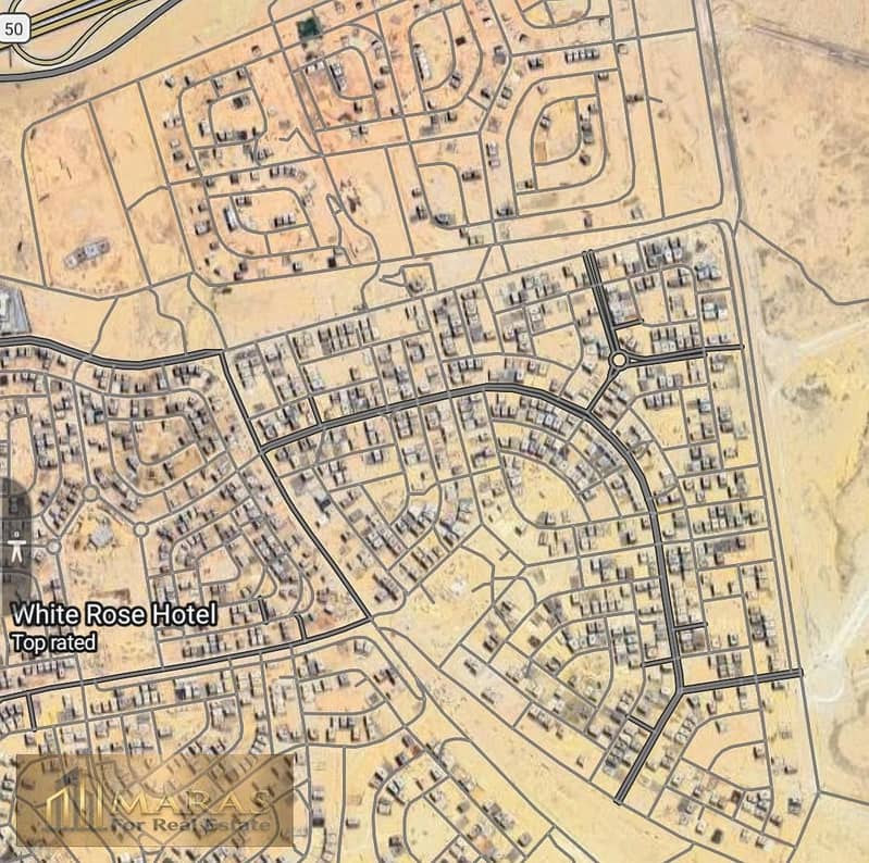 Land for Sale in Beit Al Watan First District 709 sqm Licensed Prime Location Near Palm Hills and North 90 Street - Mehr