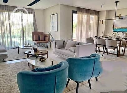 Own a luxurious garden Apartment for sale in New Cairo in the best location in Fifth Settlement on South 90th Street and Hyde Park, The Icon Compound - Więcej