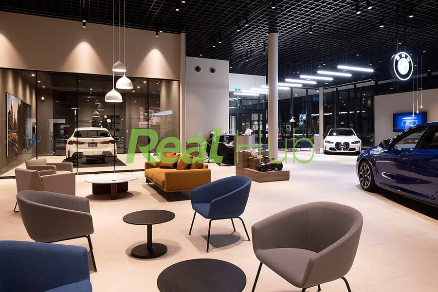 A fully finished showroom available for immediate sale, located directly on Al Nasr Road in Sheraton, next to one of Egypt's leading dealerships. - Mehr