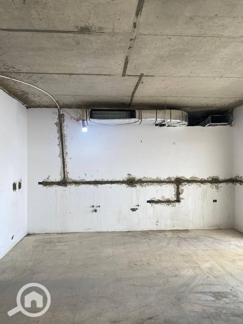 Ground floor apartment for sale with a garden in Katameya Creeks compound - Widok 5
