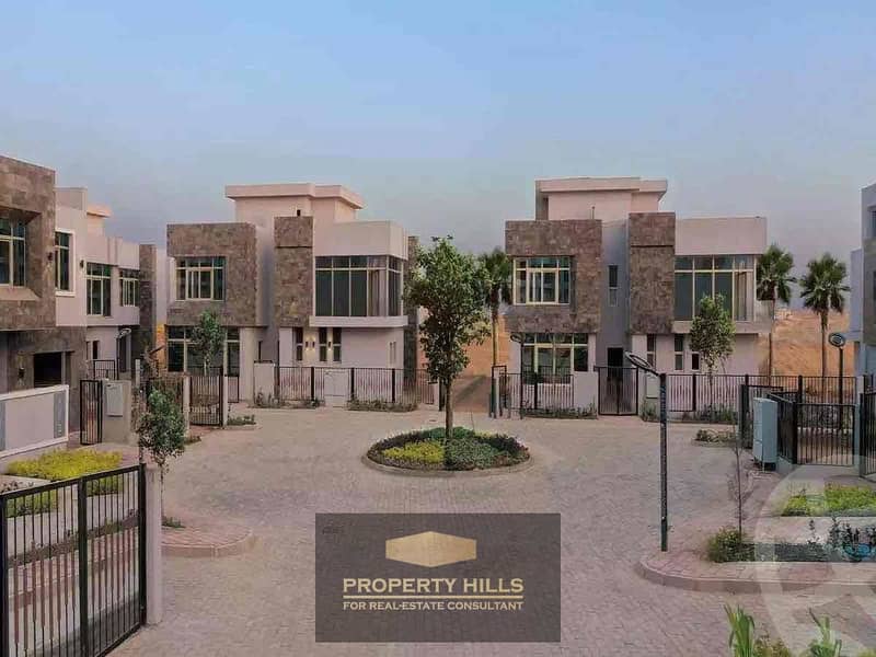 Own a villa at a bargain price next to Mivida and the American University in the heart of New Cairo. - Więcej