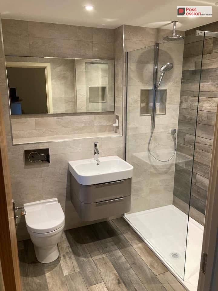 Ground floor apartment with a garden, area 275 m, 3 rooms, immediate delivery, for sale in installments in El Patio Casa Compound, El Shorouk, in fron - Mehr