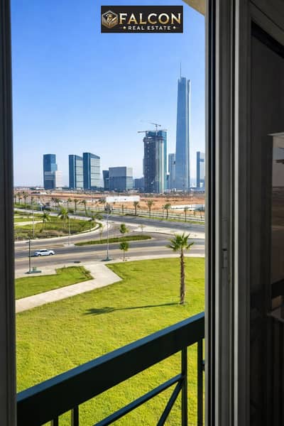 2 Bedroom Apartment for Sale in New Capital City, Cairo - City skyline from a balcony view. png