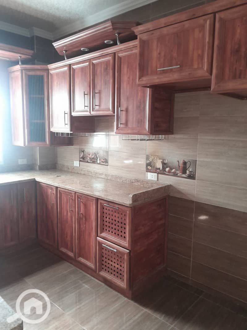 Duplex apartment for rent with kitchen in Al Banafseg Buildings. Elevator and natural gas available. Super deluxe finishing, porcelain floors, gypsum - Vaade 5