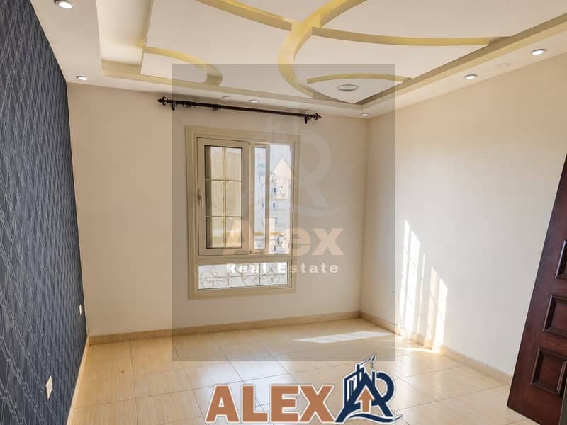 Distinctive apartment for residential rent in Zizinia with a kitchen and cabinets - Widok 5