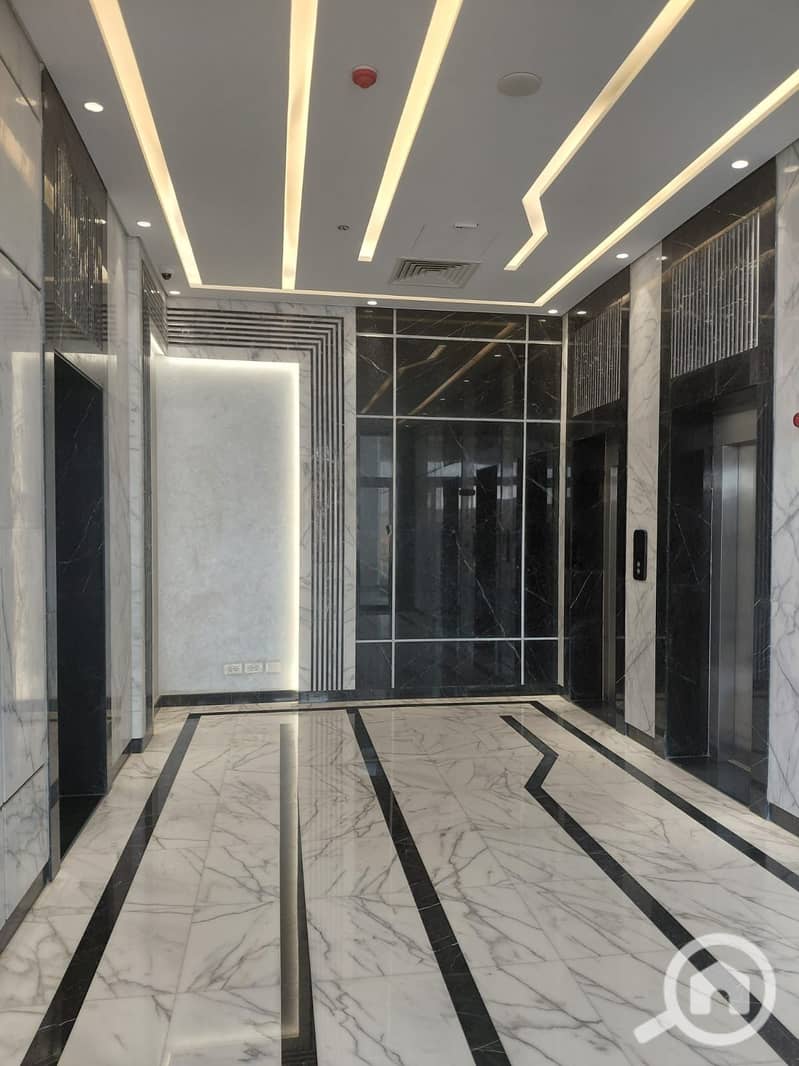 *A unique opportunity in the Fifth Settlement for cash sale or installment *Office, store, or clinic* for cash sale or installment in a prime location in the the ledge mall New Cairo - South Investors near Mountain View compound - area: 77 m - first floor - Est* - Mehr