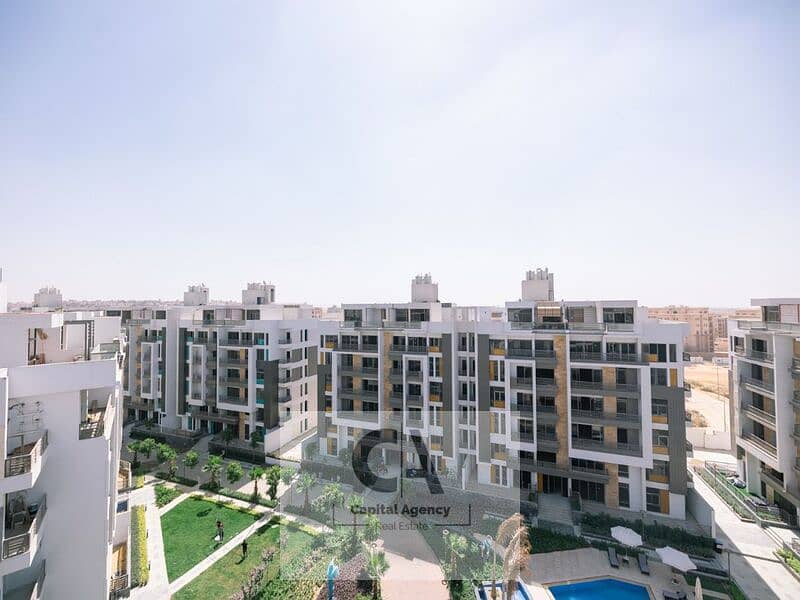 Apartment for sale in the heart of New Cairo's Fifth Settlement with a 5 % down payment in Icon Gardens Golden Square | Near the American University - Ansicht 3