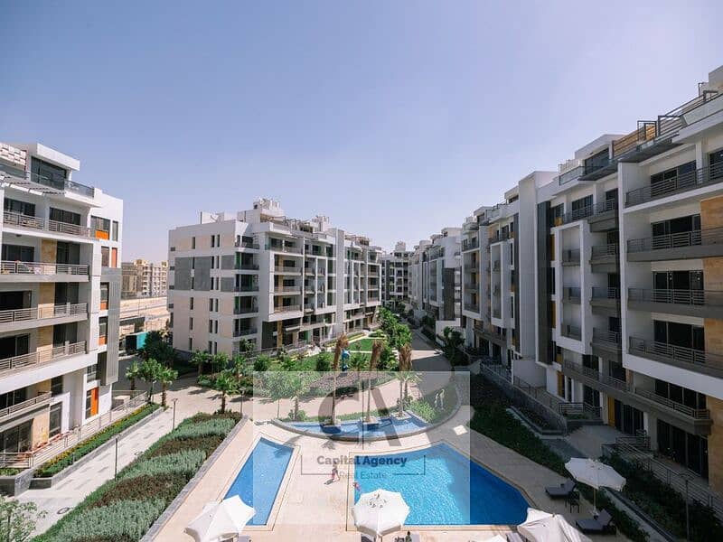 Apartment for sale in the heart of New Cairo's Fifth Settlement with a 5 % down payment in Icon Gardens Golden Square | Near the American University - Ansicht 5
