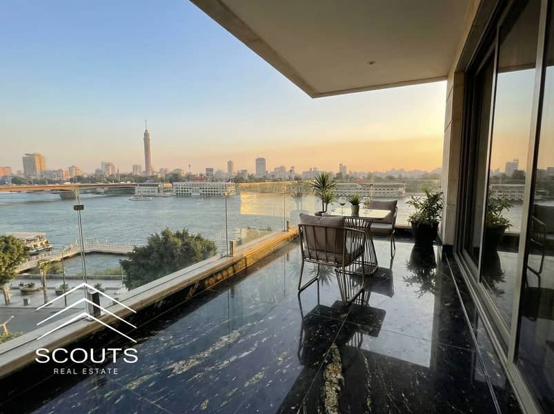 In the price of eight, an apartment for sale fully furnished and equipped, first row on the Nile Corniche in the Riv Du Nil tower, Maadi, next to the Hilton hotel. - Widok 2