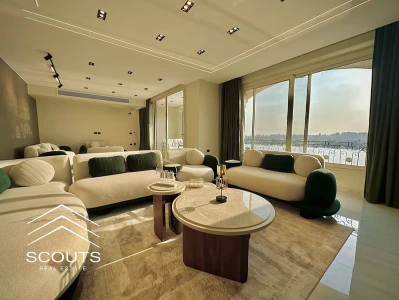 In the price of eight, an apartment for sale fully furnished and equipped, first row on the Nile Corniche in the Riv Du Nil tower, Maadi, next to the Hilton hotel. - Widok 3
