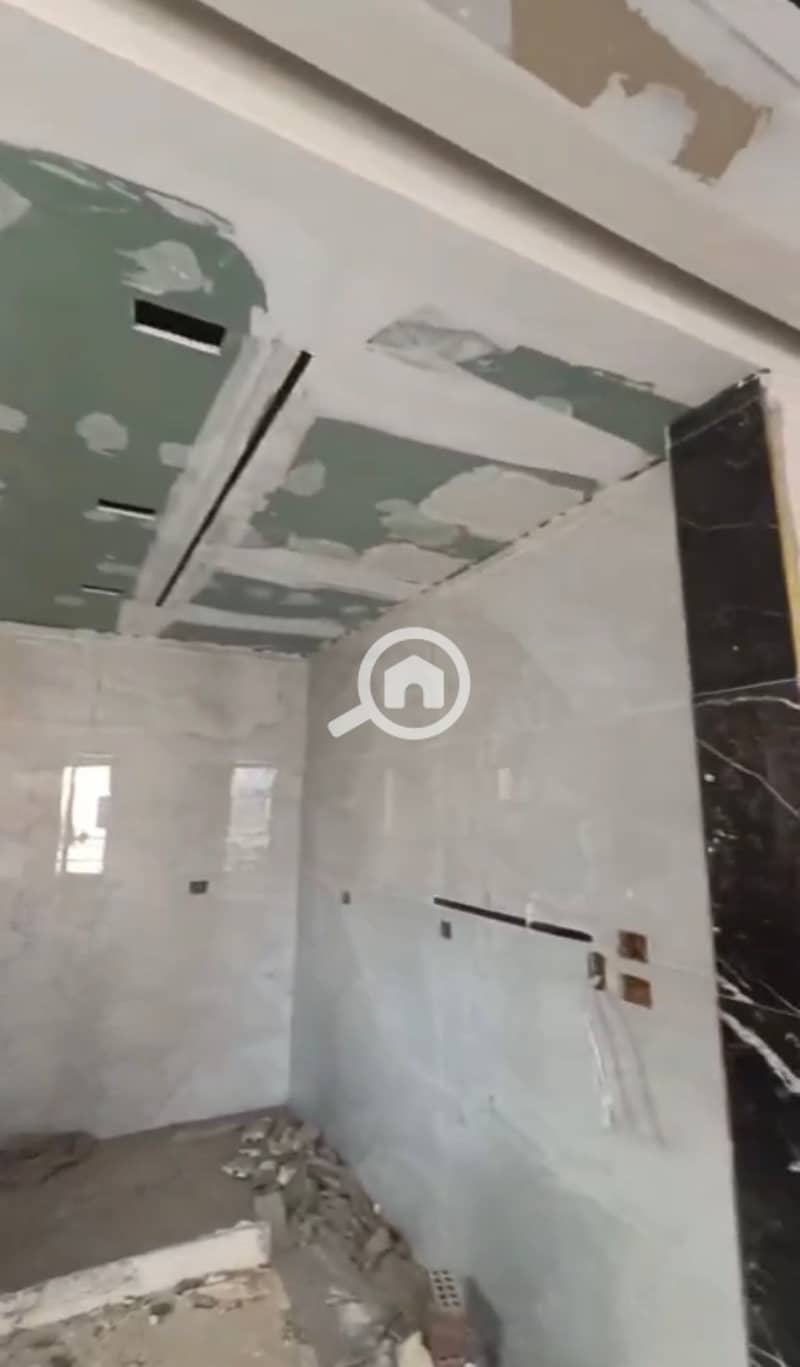 Apartment for sale 135m in Tourist Area A, Hadayek October, directly on main street, immediate delivery, behind Al-Sharbatly Mosque & commercial mall, EGP 2M cash, 3/4 finished, needs final coat, with utility meters. - Mehr