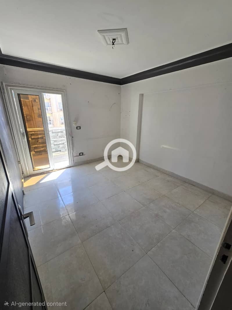 Apartment for sale on Iskandar Ibrahim Street, with two rooms and a reception area, bathroom and kitchen, on the 11th floor and not the last, with two elevators. - Mehr