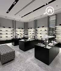 Commercial shop of 100 m for rent, suitable for any business activity, super lux finishing. All amenities available: water, electricity, and bathroom. Brand required. The lease period is long, up to 9 years, in Alexandria, Al-Agami, kilo 21, October main street, before the gate, in a very distinguished location. - Widok 2