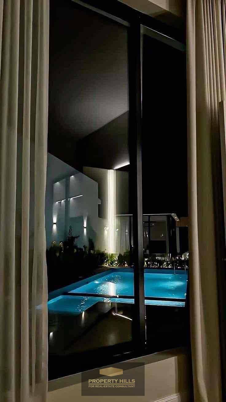 An independent villa with a huge swimming pool of 643 m² in Hassan Allam on Axis 26 at WEST MARK next to Rim Residence, La Vida Al Bustan, Al Bustan Residence, Wab Ville, and Joya. - Mehr