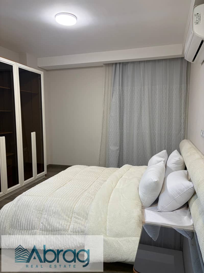 For rent: Furnished, modern, air-conditioned 3-bedroom apartment in Zed West Compound, Sheikh Zayed, with a landscape view. - Widok 3