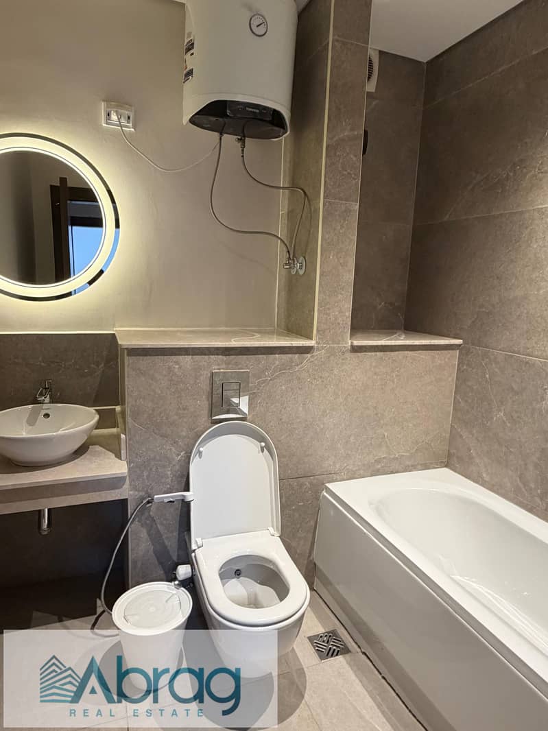For rent: Furnished, modern, air-conditioned 3-bedroom apartment in Zed West Compound, Sheikh Zayed, with a landscape view. - Więcej