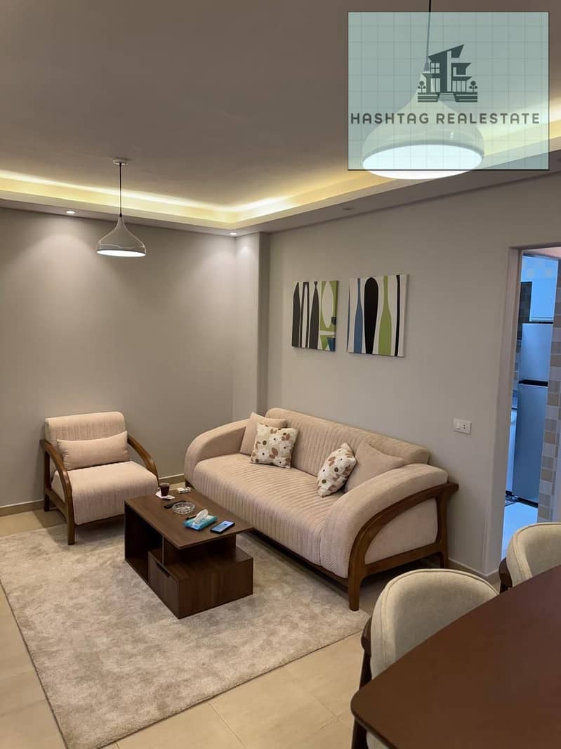 Luxury hotel apartment for rent in حي 16 Badreldin, just meters from Mazar Mall and close to Beverly Hills Sheikh Zayed, in front of Kompond El Karma on a main street. – pohled 2