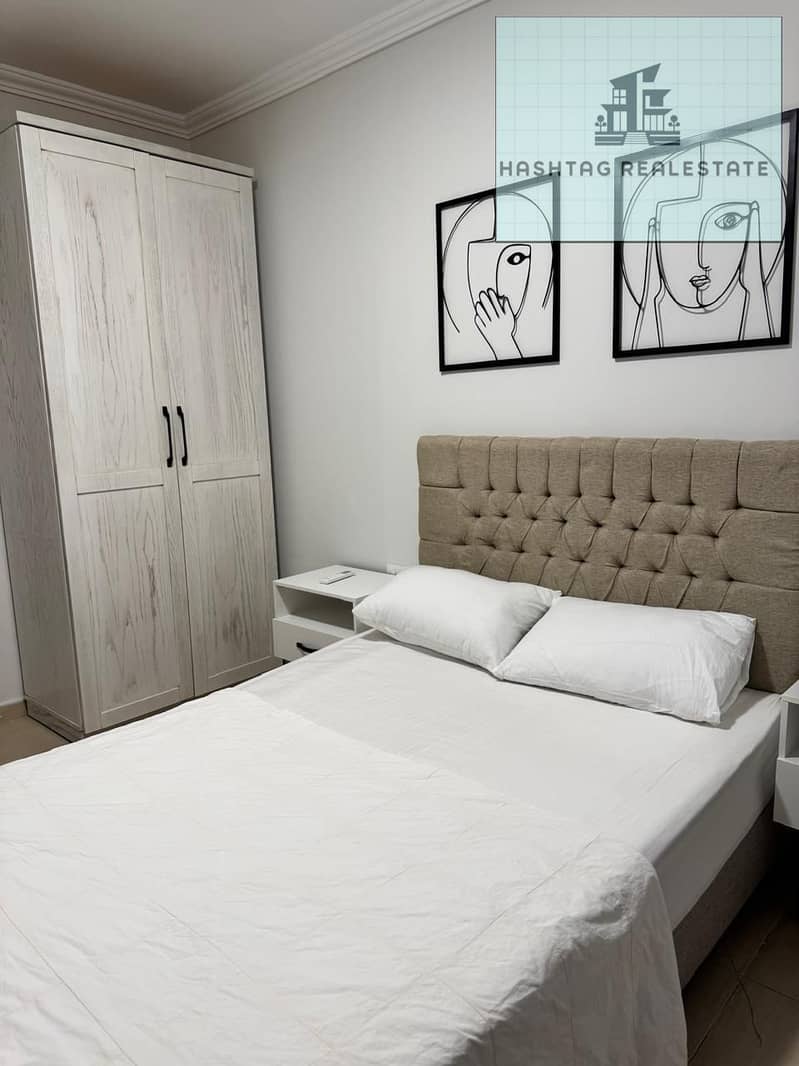 Luxury hotel apartment for rent in حي 16 Badreldin, just meters from Mazar Mall and close to Beverly Hills Sheikh Zayed, in front of Kompond El Karma on a main street. – pohled 5