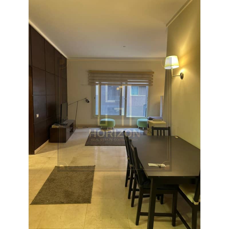 lowest price furnished Studio for sale The Village Palm Hills New Cairo - Vista 3