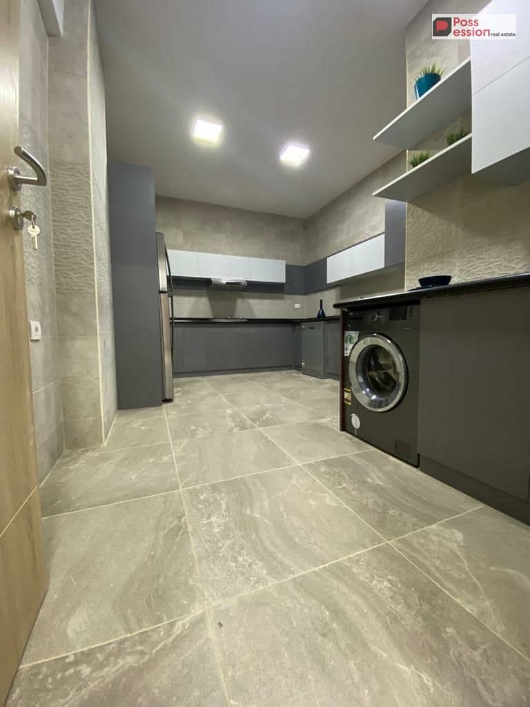 140 sqm apartment for sale in Azzar Compound, Fifth Settlement, with a monthly installment of 26,000 (Prime location overlooking green spaces) - Widok 3