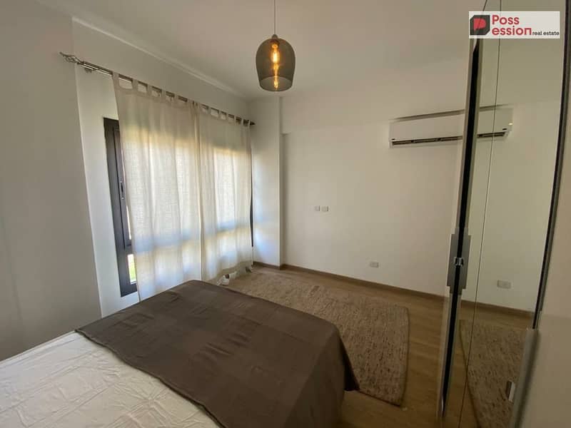 140 sqm apartment for sale in Azzar Compound, Fifth Settlement, with a monthly installment of 26,000 (Prime location overlooking green spaces) - Widok 4
