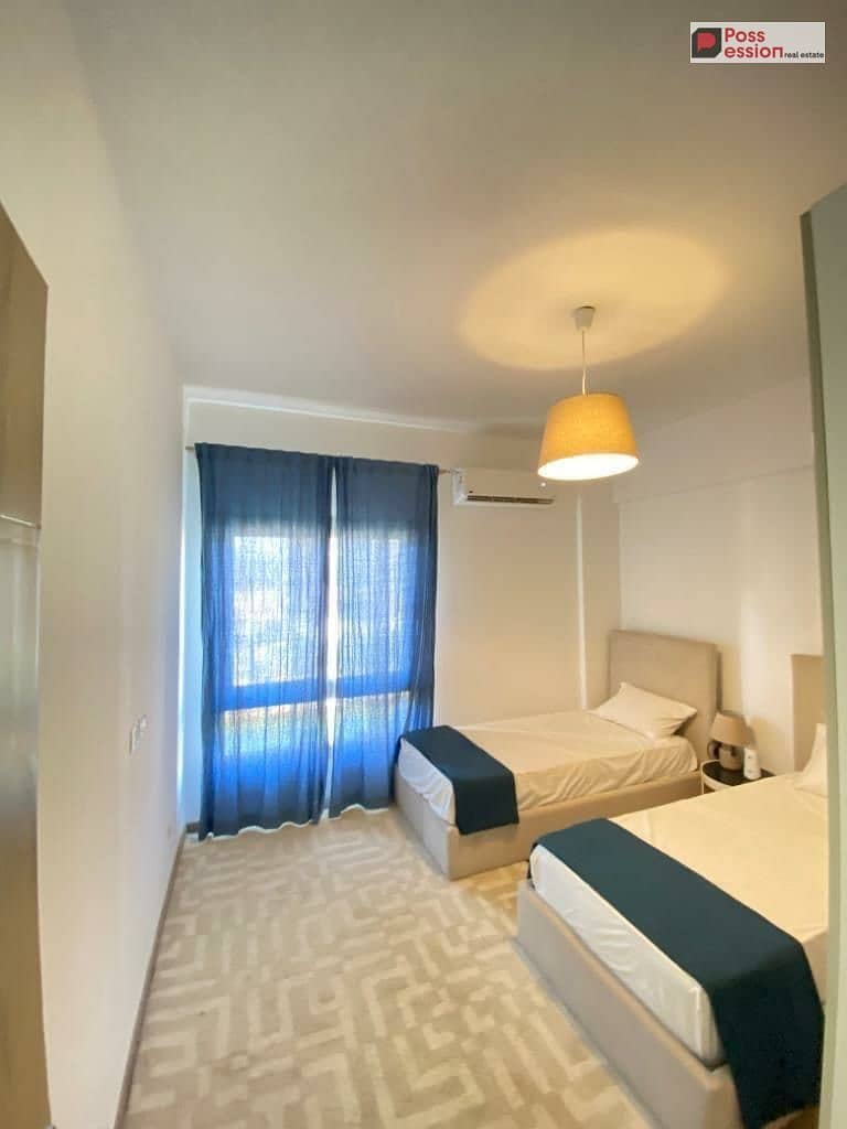 140 sqm apartment for sale in Azzar Compound, Fifth Settlement, with a monthly installment of 26,000 (Prime location overlooking green spaces) - Widok 5