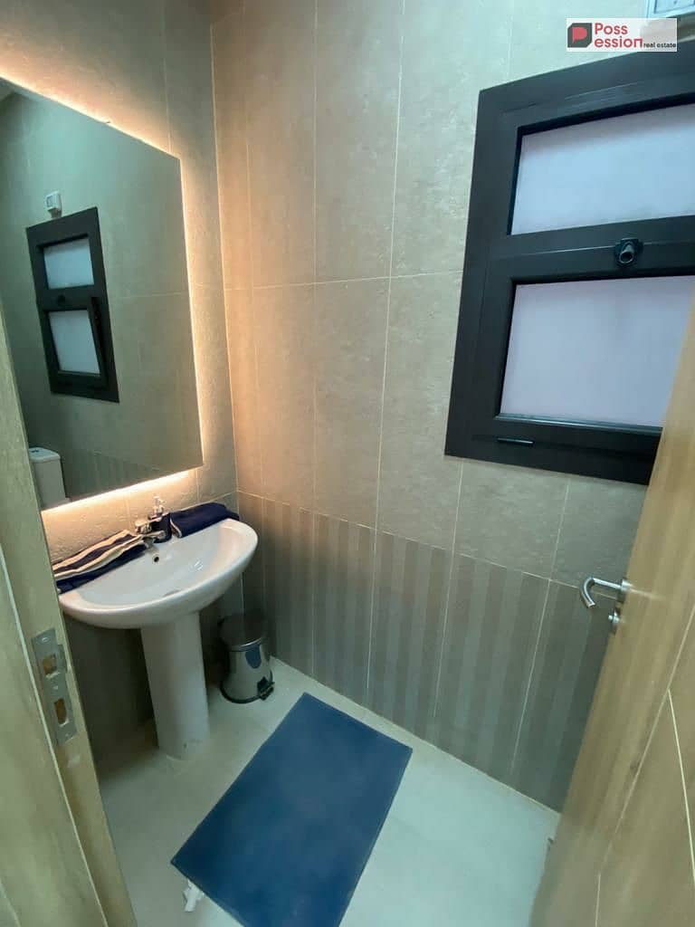 140 sqm apartment for sale in Azzar Compound, Fifth Settlement, with a monthly installment of 26,000 (Prime location overlooking green spaces) - Widok 6