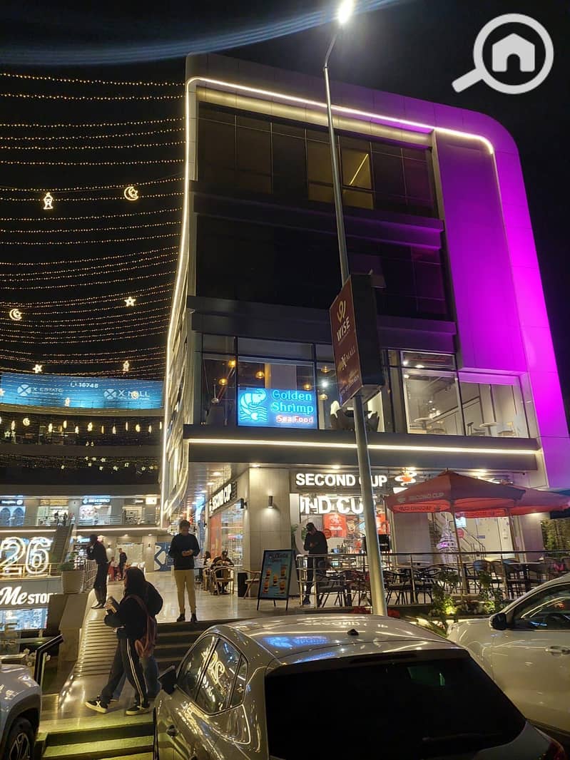 Commercial store for rent with immediate return in التجمع الخامس | Immediate delivery | Monthly income of 115,000 EGP - Ansicht 2