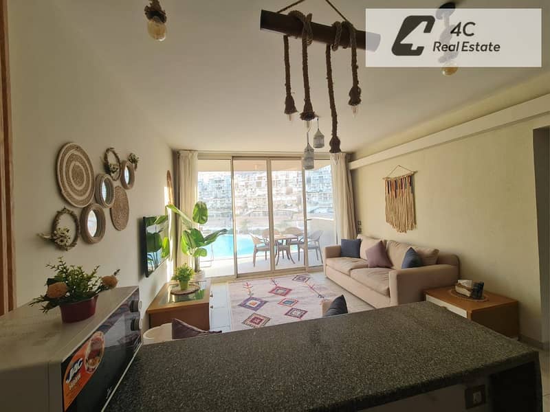 Chalet for sale Ready to move 2 bdr fully finished with Acs & Furniture very prime location view direct lagoon in IL Monte Galala Ain Sokhna - Widok 3