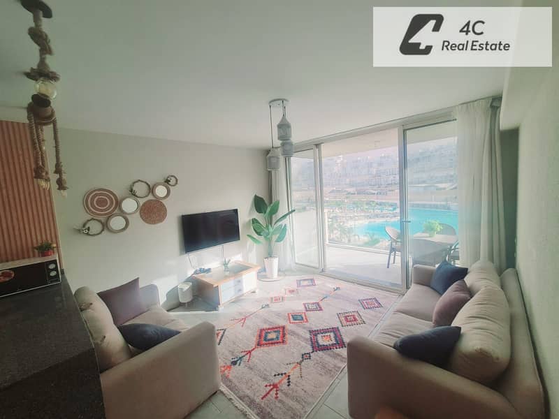 Chalet for sale Ready to move 2 bdr fully finished with Acs & Furniture very prime location view direct lagoon in IL Monte Galala Ain Sokhna - Widok 4