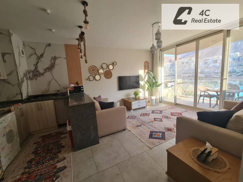 Chalet for sale Ready to move 2 bdr fully finished with Acs & Furniture very prime location view direct lagoon in IL Monte Galala Ain Sokhna - Widok 5