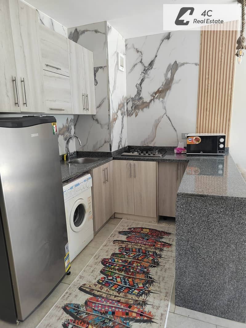 Chalet for sale Ready to move 2 bdr fully finished with Acs & Furniture very prime location view direct lagoon in IL Monte Galala Ain Sokhna - Widok 6