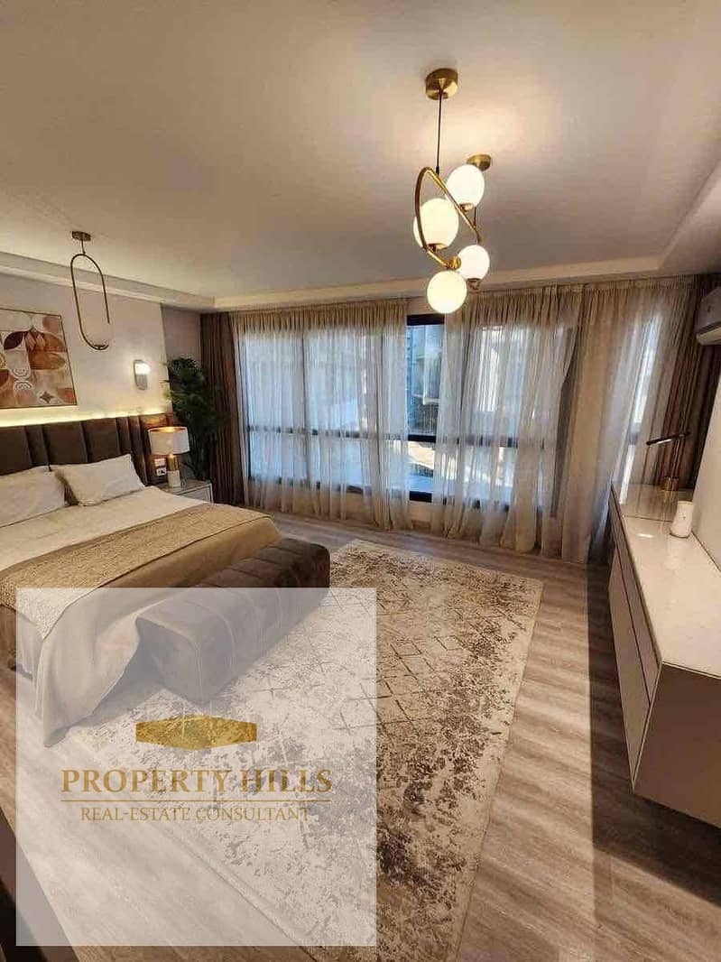 Last apartment in the compound with a garden, immediate delivery, fully finished. The compound has all services and is located with a direct view of the landscape on the Suez Road, in front of the Open Air Mall, Madinaty. - Widok 5