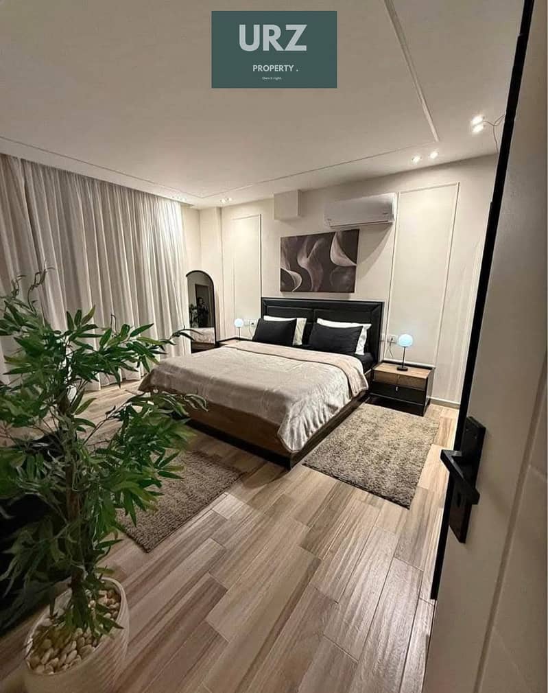 Apartment with a panoramic Green River view in a prime location in the New Capital, with flexible 15-year installments, near Scenario, Scene 7, Celia, - Mehr