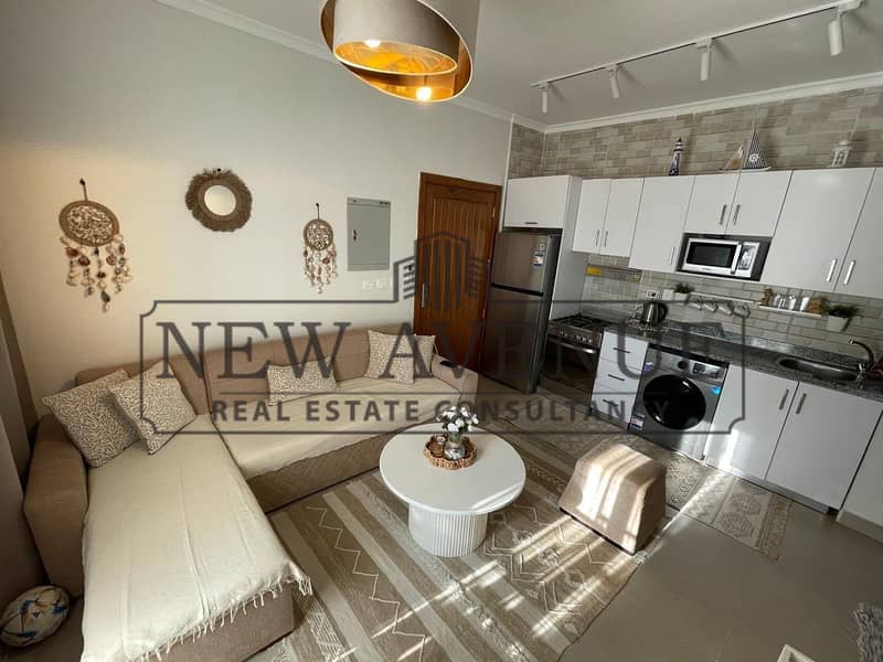 Ready to move Ground Studio with Garden in Gaia North Coast furnished with appliances by Al Ahly Sabbour - Vista 6